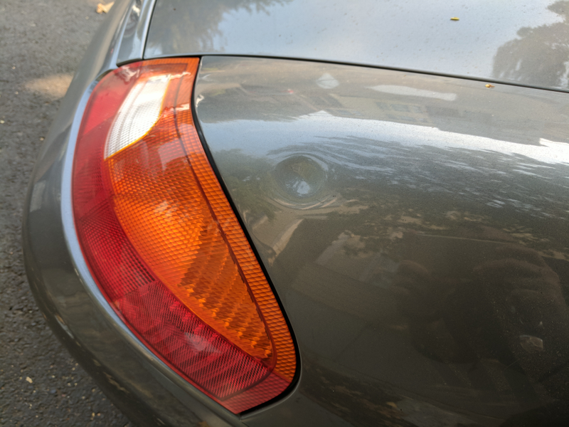 Illustration for article titled Stumbling Asshole Caught On Video Denting A Street-Parked Porsche